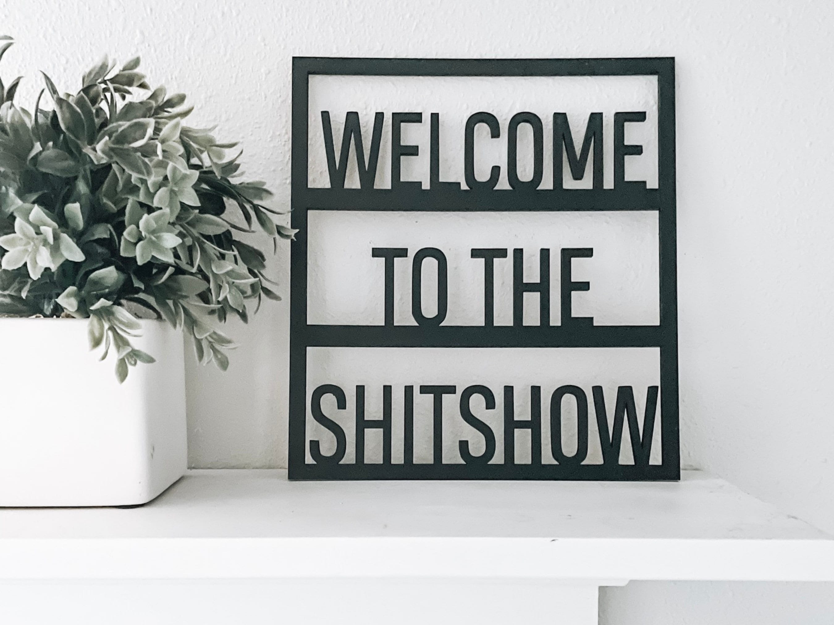 Welcome to the ShitShow sign